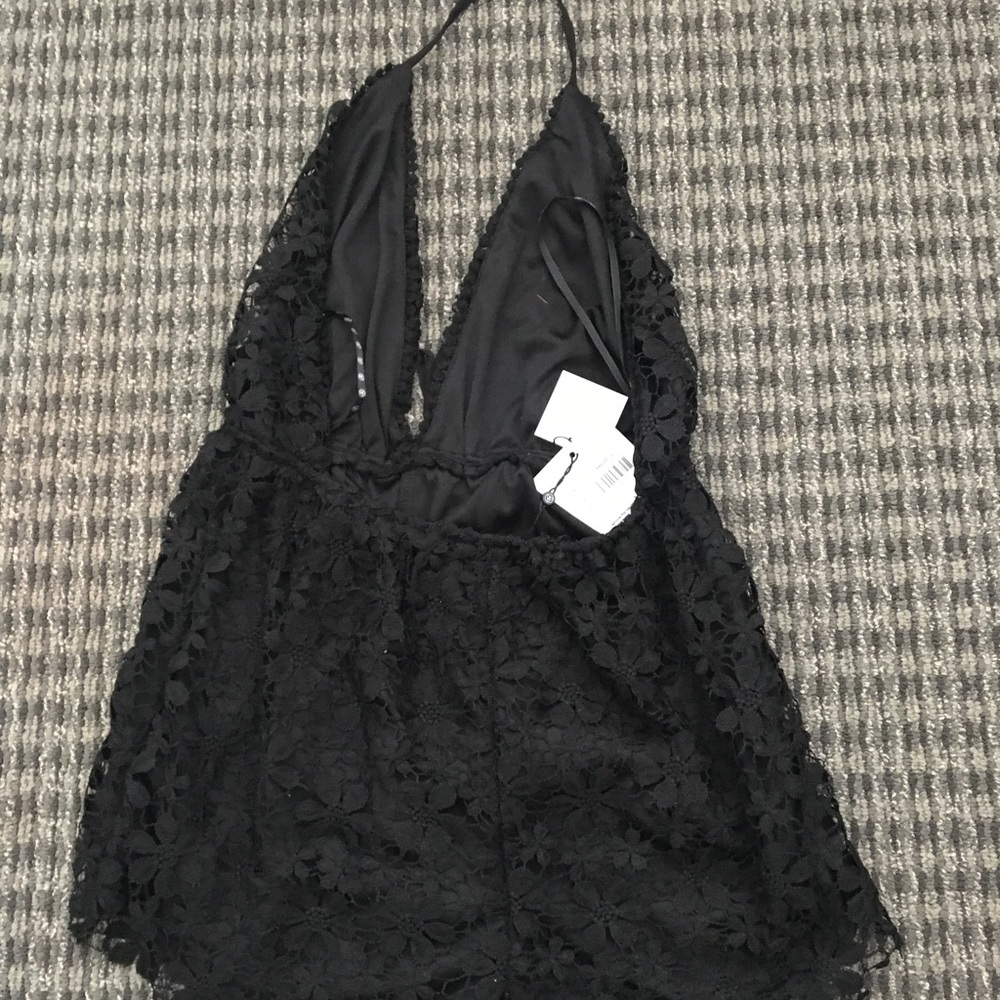 Cute lace black romper new with tags